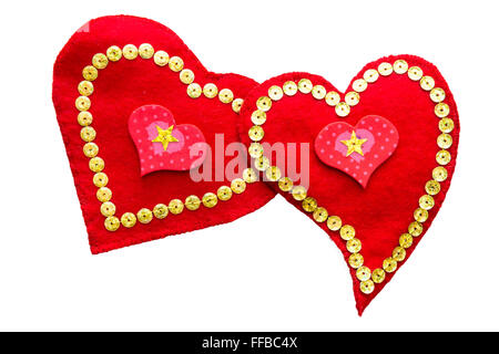 Une paire de coeurs d'amour à la main à partir de se sentaient isolés Banque D'Images