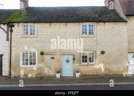 Paire de cottages en pierre de Cotswold à Winchcombe, Gloucestershire Banque D'Images