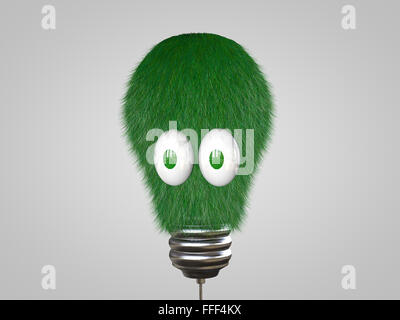 Ampoule avec les yeux couverts dans l'herbe verte. Banque D'Images