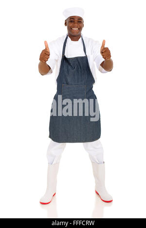 Full Length portrait of young African American butcher Thumbs up Banque D'Images