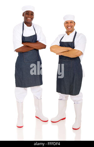 Joyeux bouchers avec bras croisés sur fond blanc Banque D'Images