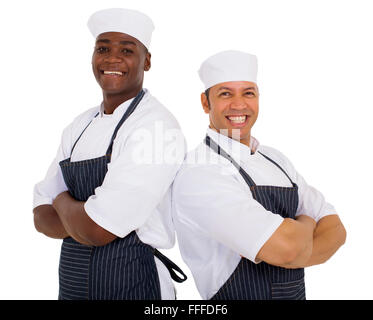 Portrait of smiling chefs de restaurant les bras croisés Banque D'Images