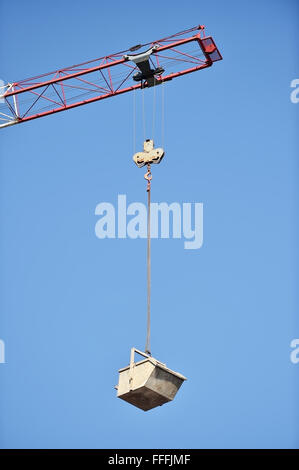 Détail photo avec un chargement d'une grue de construction des emballages industriels Banque D'Images