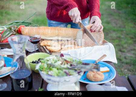 Personne sur garden party trancheuse pain Banque D'Images