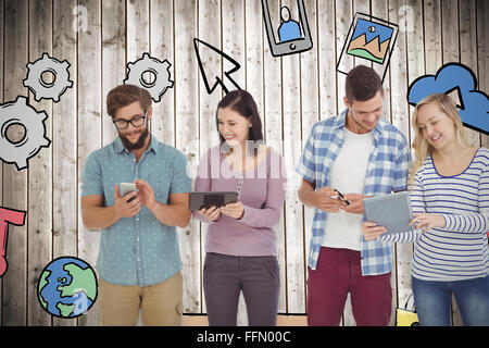 Portrait of business people using electronic gadgets Banque D'Images