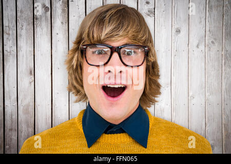 Composite image of businessman hipster surpris Banque D'Images