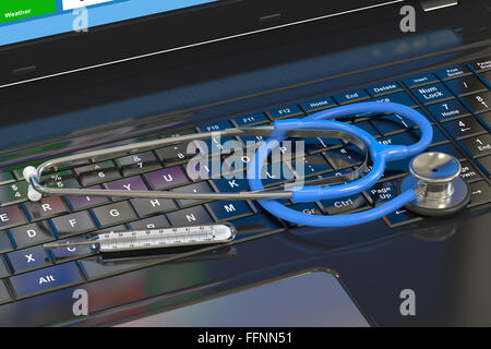 Stéthoscope avec thermomètre sur clavier d'ordinateur portable Banque D'Images