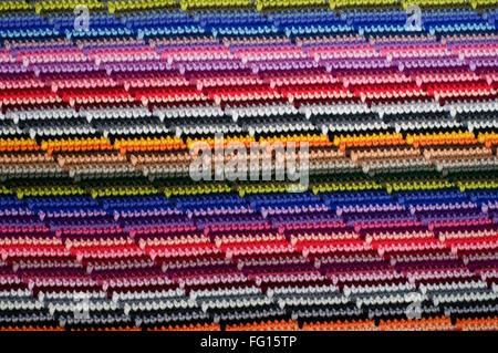 Couleur de fond en tricot à rayures dans des couleurs différentes Banque D'Images