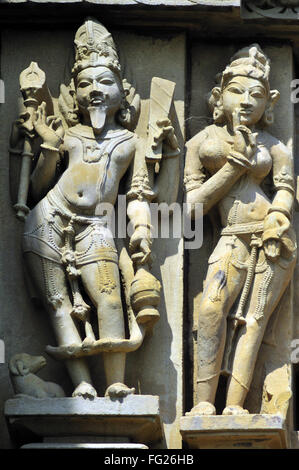 Agni dieu sculpture sur le mur de temple vishvanath Khajuraho Madhya Pradesh, Inde Banque D'Images