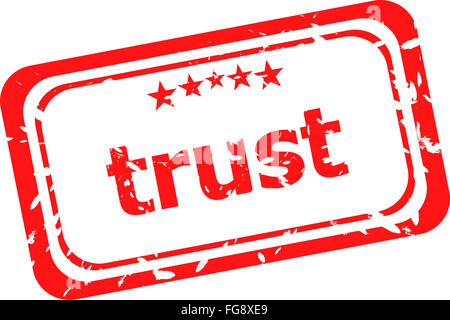 Trust de tampon en caoutchouc rouge sur un fond blanc Banque D'Images