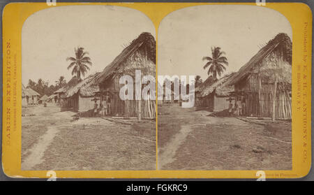 Une photographie vintage du 19ème siècle montrant une rue à Pinogana, prise par la firme E. & H.T. Anthony, capturant l'architecture historique et la vie de rue de la région à cette époque. Banque D'Images
