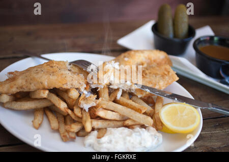 Chip Shop BXTN, Hip-hop et du poisson à thème friterie à Brixton, servant du poisson frais et des plats de fruits de mer, dans le sud de Londres, Angleterre, RU Banque D'Images