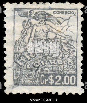 BUDAPEST, HONGRIE - 20 février 2016 : un timbre imprimé dans le Brésil montre l'allégorie de la guérison, vers 1921 Banque D'Images