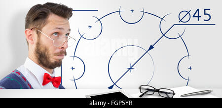 Image composite de hipster geek wearing christmas vest Banque D'Images