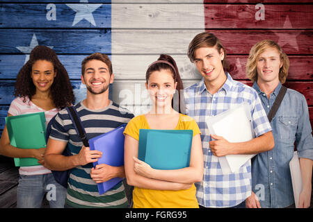 Image composite d'étudiants holding folders in college Banque D'Images