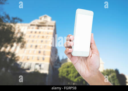 Image composite de portrait of businesswoman holding smart phone