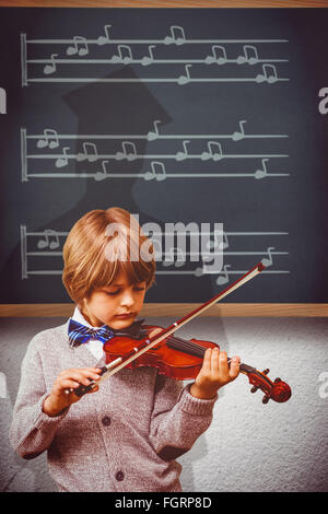 Image composite de cute little boy playing violin Banque D'Images