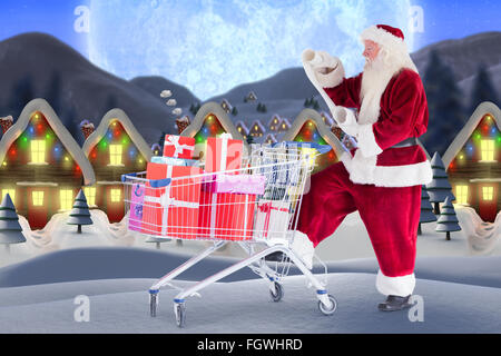 Image composite de santa offrant des cadeaux de panier Banque D'Images