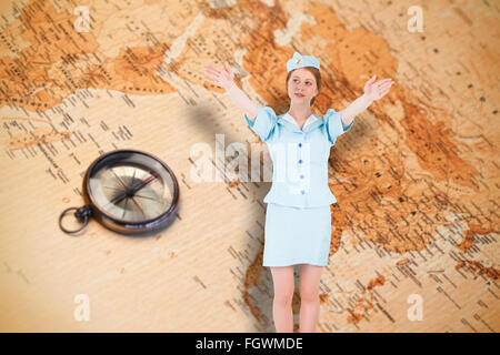 Image composite de joli air hostess with arms raised Banque D'Images