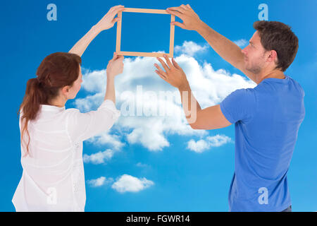 Image composite du couple de décider de suspendre photo Banque D'Images