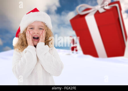 Image composite de petite fille de fête avec les mains sur le visage Banque D'Images