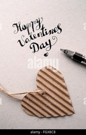 HAPPY VALENTINE'S DAY part - lettrage calligraphie faite à la main Banque D'Images