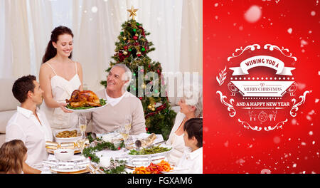 Composite image montrant la Turquie à sa famille pour Noël Banque D'Images