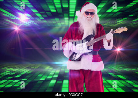 Image composite de santa claus joue de la guitare avec des lunettes Banque D'Images