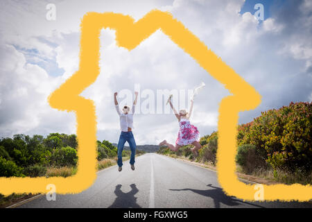 Image composite de l'heureux couple jumping on the road Banque D'Images