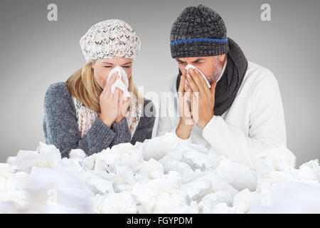 Image composite de couple l'éternuement dans les tissus Banque D'Images