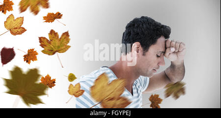 Image composite de colère man leaning on white background Banque D'Images