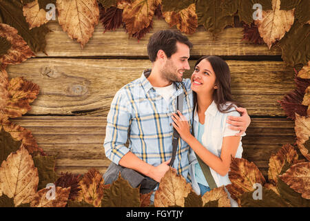 Composite image jeune couple passe leurs vacances Banque D'Images