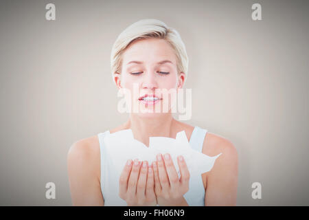 Image composite des tissus malades woman holding Banque D'Images