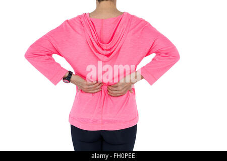 Mature Woman in sportswear retour massage Banque D'Images