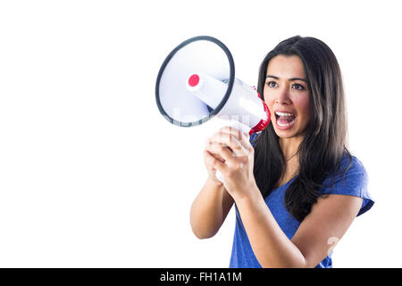 Femme criant dans un mégaphone Banque D'Images