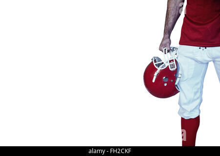 Portrait d'un joueur de rugby holding helmet Banque D'Images