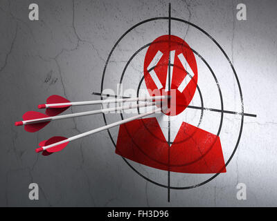 Logiciel Concept : les flèches en cible programmeur sur wall background Banque D'Images