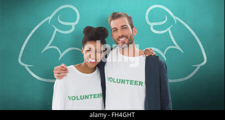 Image composite de portrait de deux jeunes volontaires avec les bras autour de Banque D'Images