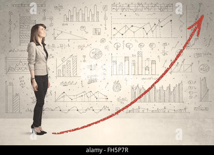 Business Woman climbing on red graph concept flèche Banque D'Images