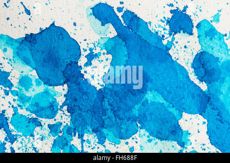 Blue abstract avec de l'encre aquarelle sur papier grainé blanc blots. À utiliser comme arrière-plan ou de texture. L'élément de conception. Banque D'Images