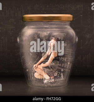 Businesswoman traped en pot avec des symboles graphique graph concept Banque D'Images