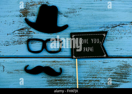 Une pancarte en forme de drapeau noir avec le texte que j'aime papa, et une moustache, une paire de lunettes et un chapeau qui forment le visage de Banque D'Images