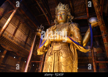 Avalokiteśvara énorme statue en monastère Gandantegchinlen, Ulaanbaatar, Mongolie Banque D'Images