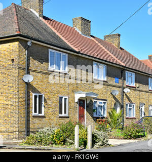 Immobilier Conseil premier bloc de maisons achevé le LCC Becontree Housing Estate 1921 enregistrées sur blue plaque maintenant à Barking and Dagenham East London UK Banque D'Images