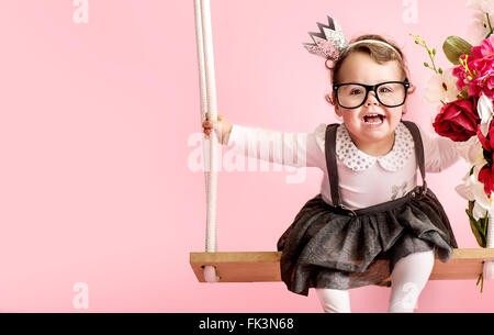 Portrait of a cute toddler wearing eyeglasses Banque D'Images