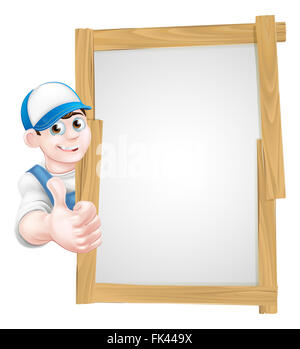 Cartoon mécanicien, plombier, jardinier, bricoleur ou décorateur leaning autour d'un panneau en bois et donnant un Thumbs up Banque D'Images