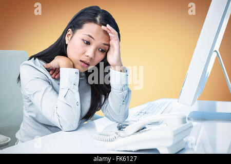 Of Asian businesswoman with hands on face Banque D'Images