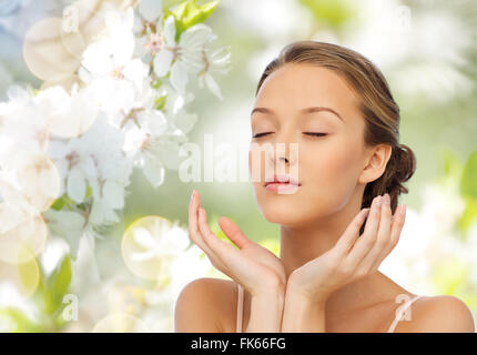 Jeune femme visage et des mains Banque D'Images