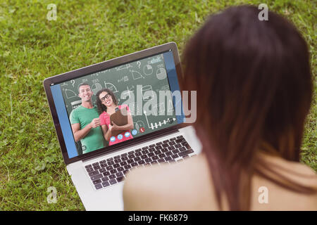 Image composite de portrait of smiling business people avec presse-papiers Banque D'Images