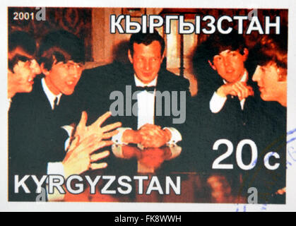 KIRZIGUISTAN - circa 2001 : timbres en Kirziguistan montre les Beatles et Brian Epstein, vers 2001 Banque D'Images